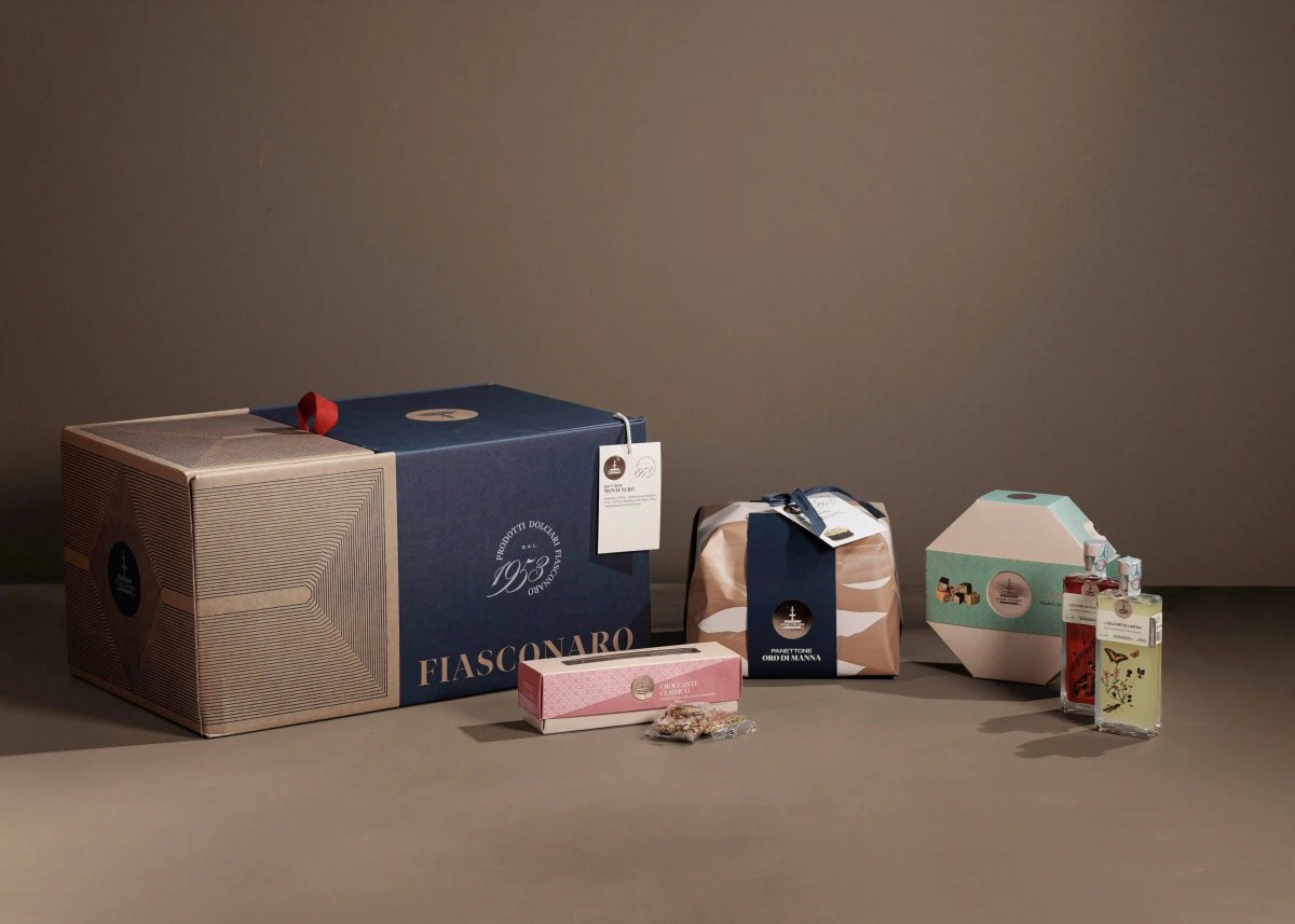 Gift Box Tradizionale Fiasconaro Natale 2026 con panettone tradizionale, torroncini, cubaita e liquore al limone